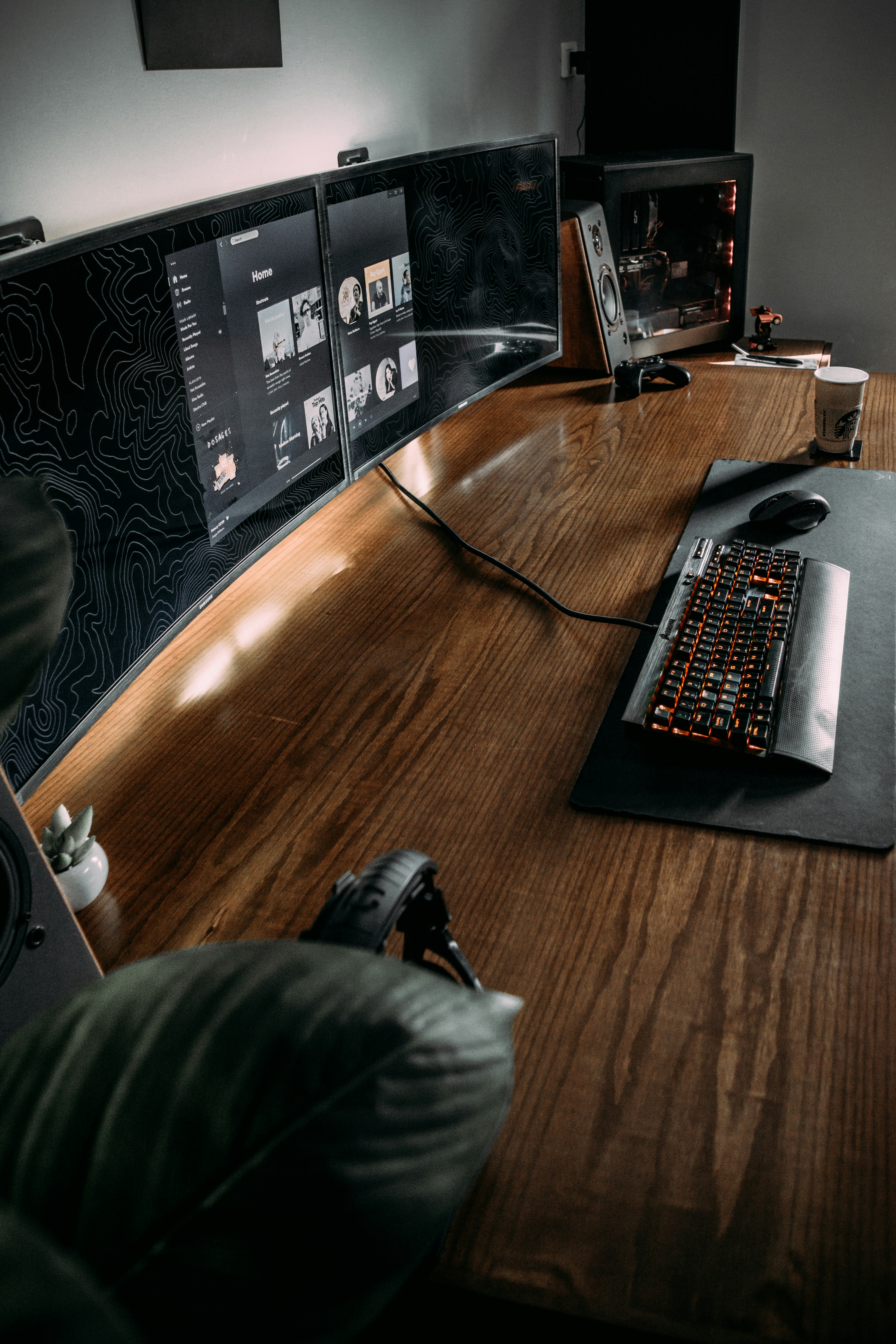 black computer keyboard on brown wooden table